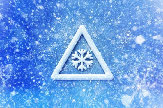 ancillary graphic showing warning symbol made up of snow