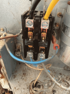 AC contactor component replaced during air conditioning repair in San Antonio TX