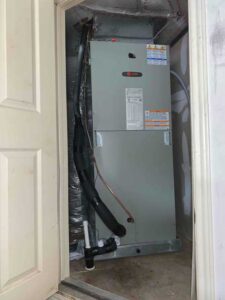 New Trane air handler installed in garage closet in Helotes TX