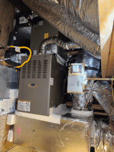 Carrier furnace installed in attic with updated ductwork and airflow components in Pflugerville TX
