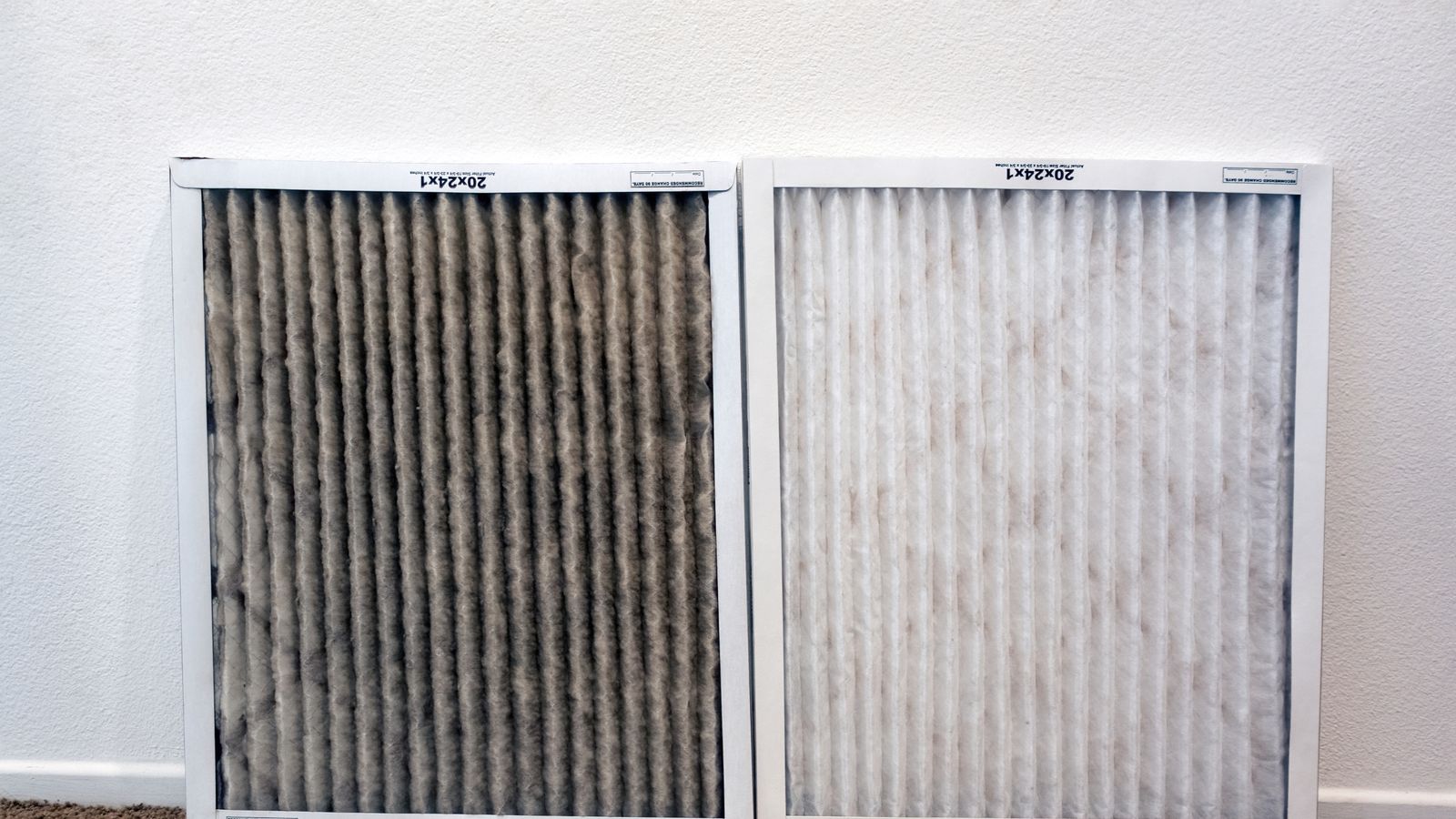 A clean and dirty HVAC air filter side by side
