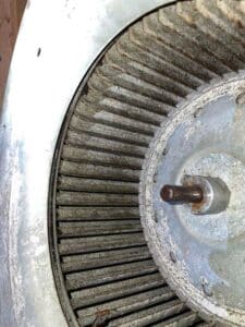 Up close of a blower motor wheel after being cleaned