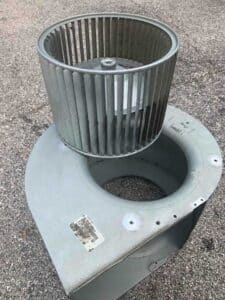 Parts of an HVAC blower motor after cleaning