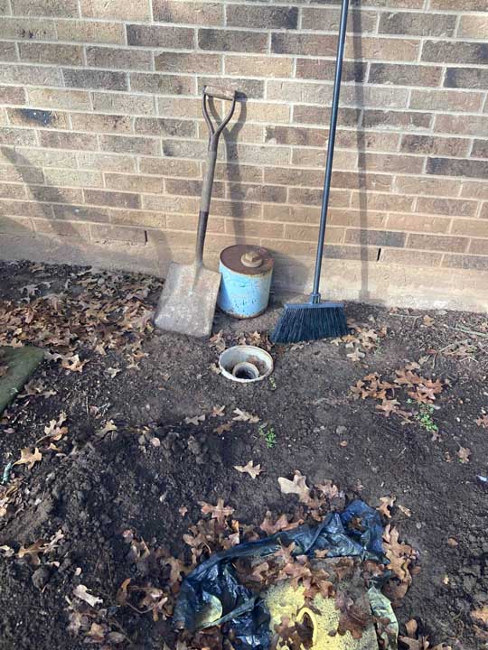 Exterior cleanout access during drain line installation in Cedar Park