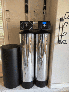 Whole home water softener and filtration system installed in garage in Austin TX