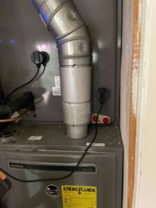 Ruud gas furnace with updated venting and safety sensors installed