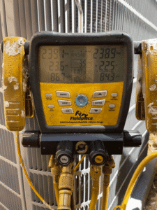HVAC diagnostic gauges showing system pressure and performance readings during installation in Austin TX