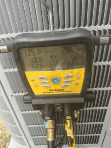 HVAC system pressure and temperature readings during heat pump installation in Cedar Park TX