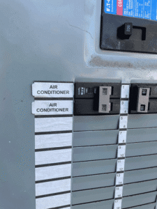 Electrical panel with dedicated air conditioner breakers installed for HVAC system in Austin TX