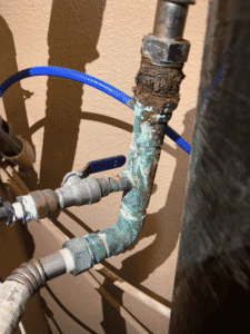 Corroded plumbing pipe contributing to low water pressure in Spring Branch TX