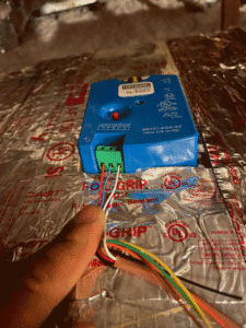 HVAC zoning control component installed in duct system to manage airflow between zones